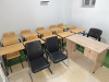 10 Tables et chaises scolaires plus un bureau et 3 chaises confortables.