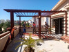 Fabrication et installation de pergola et tinda en bois rouge