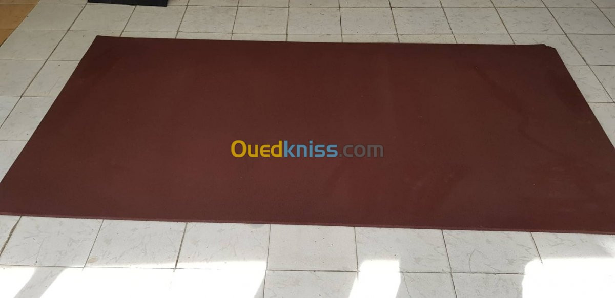 Tapis gomme amortissant