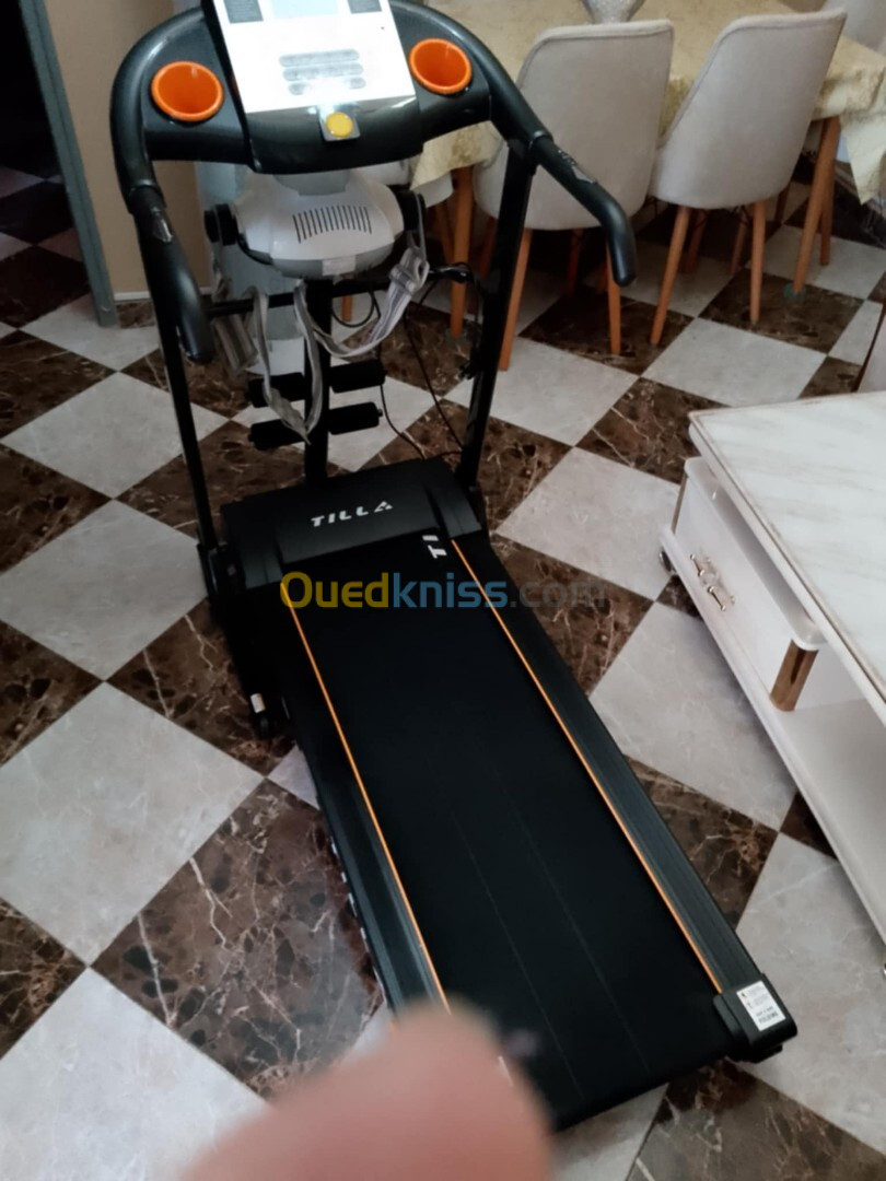 Tapis roulant avec vibreur masseur