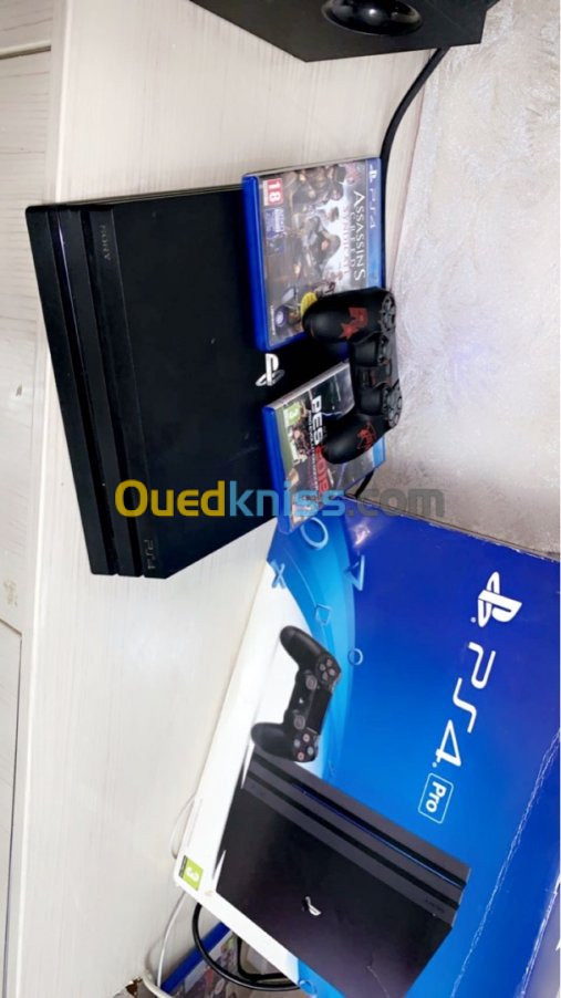 Ps4 pro 1TB jdid  état neuf