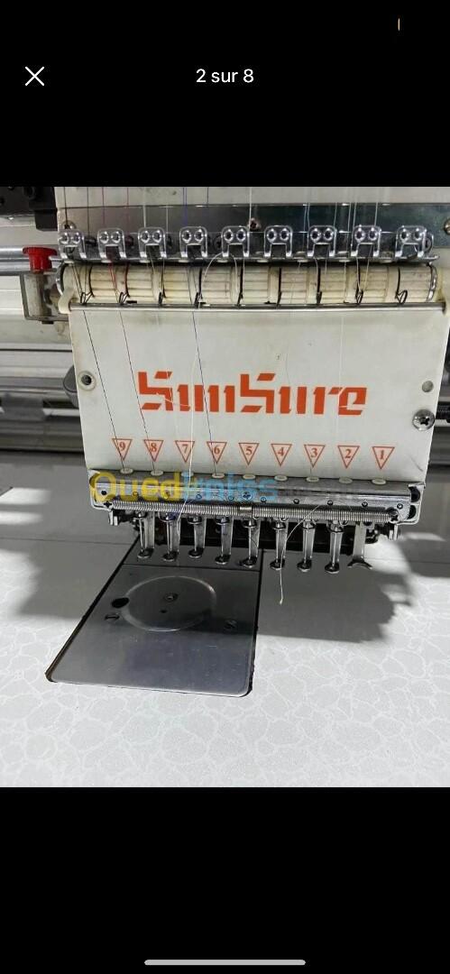 Machine broderie et gro file sansure