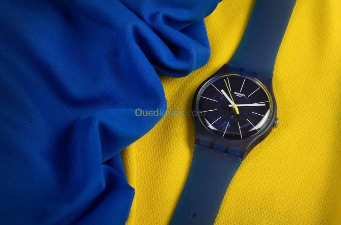 Une très belle montre originale swatch BLUE SIRUP original pour homme 