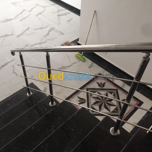 installation de rampe d'escalier inox