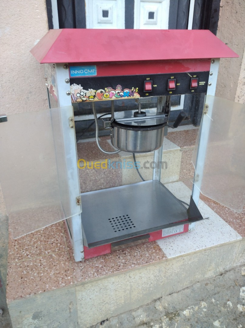 Machine à popcorn      مكينة الفشار.      