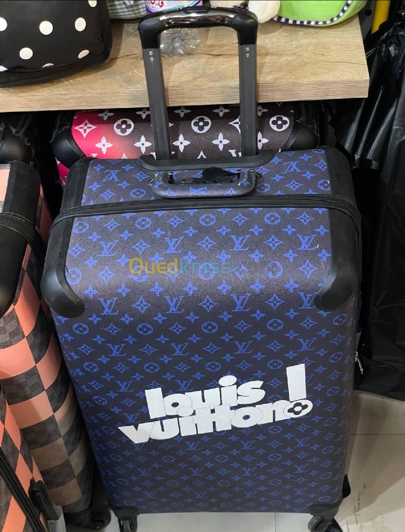  la valise 3 pièces Louis Vuitton 