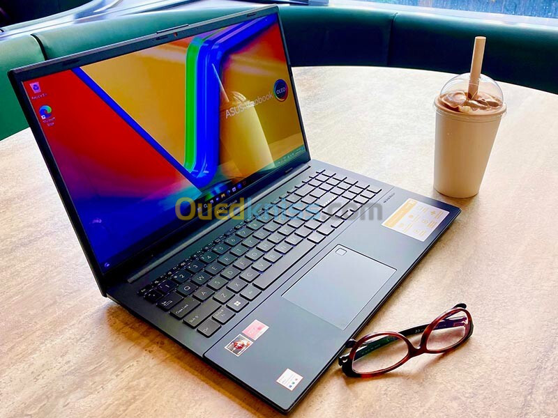 ASUS VIVOBOOK OLED E1504F -RYZEN 5-7520U / /RAM= 16 GO/SSD 512GB  /ECRAN 15.6."OLED