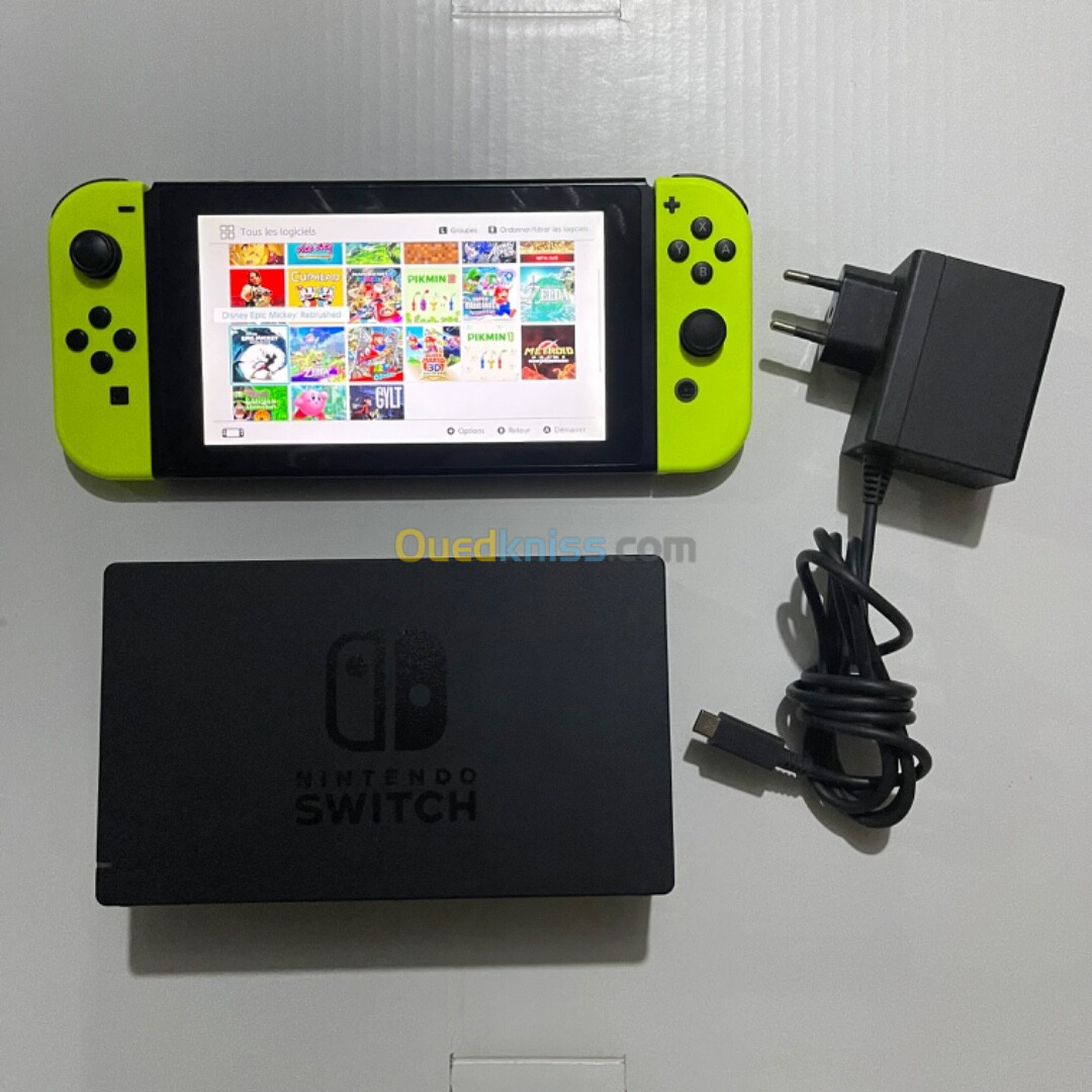 Nintendo switch v1 10/10 sd 128gb flashé avec dock et chargeur 21 jeux installes 