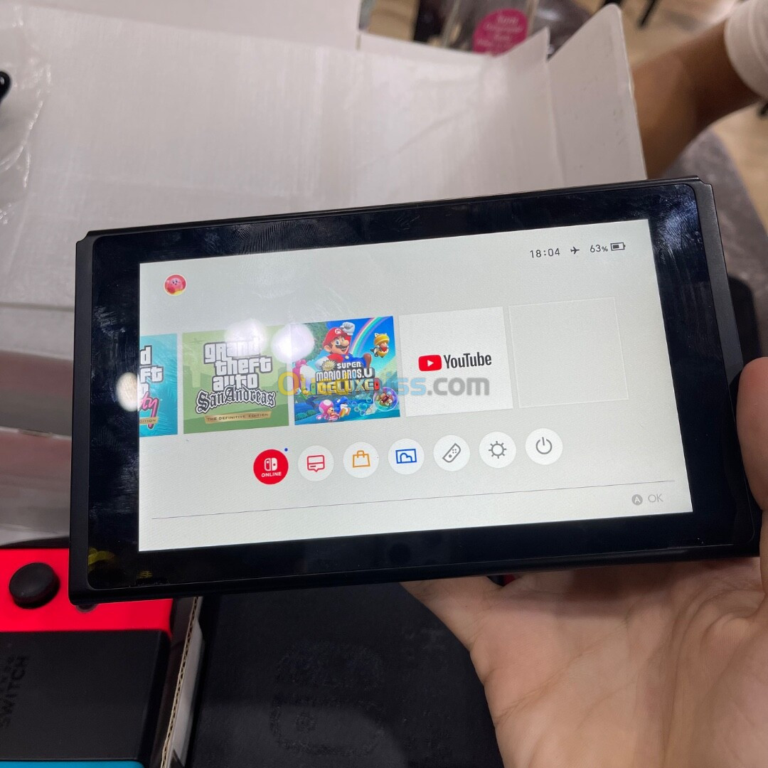 Nintendo switch v2 2021 avec tout ses accessoires état 10/10 non flashé 