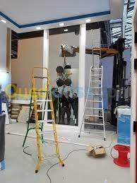 STAND D'EXPOSITION (montage mobiliers et peinture)