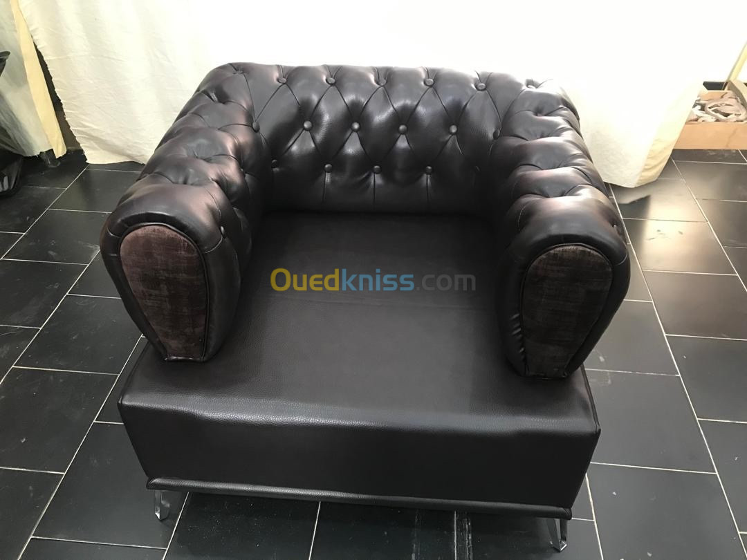 Fauteuil capitonné