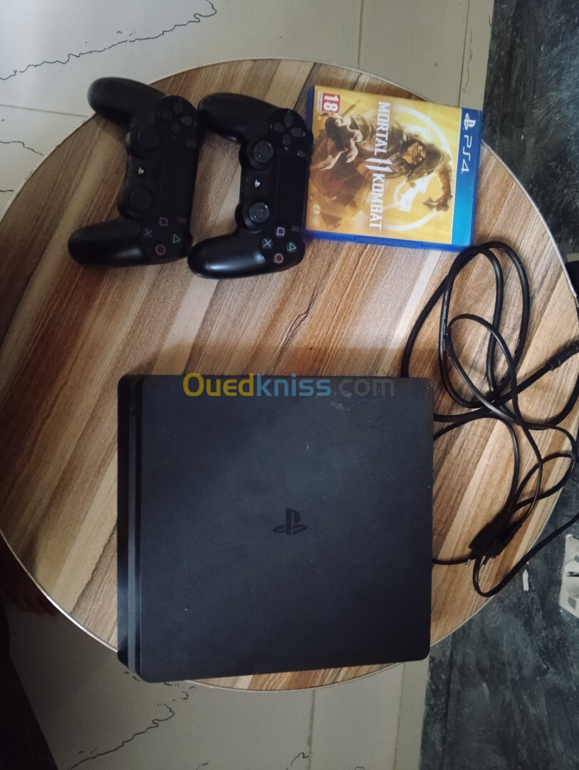 Pack Ps4 slim 500go+2manette original+CD mo*rtall combat 11