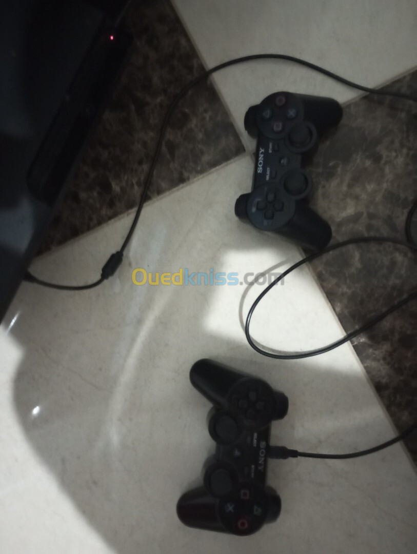 Playstation 3 jdid fih 2 manette w les jeux