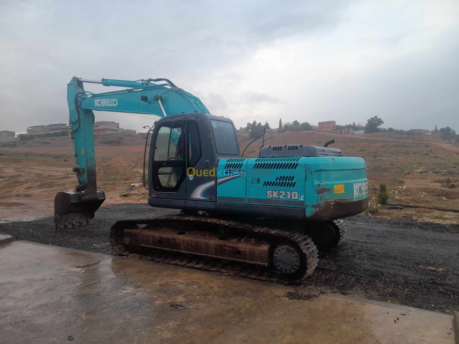 kobelco - sk210 الة حفر 2015