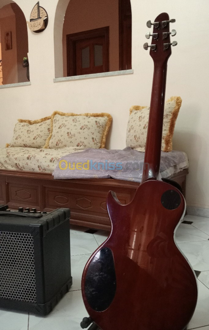 Guitare +ampli Roland Cube 15w