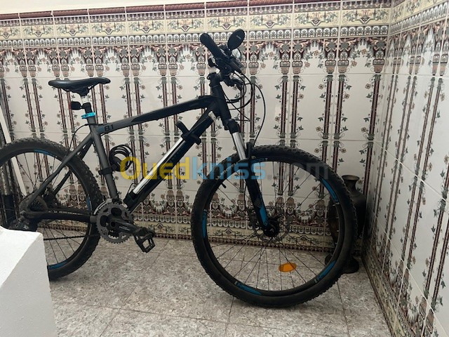 VTT ROCKRIDER 8.1 RR Comme Neuf