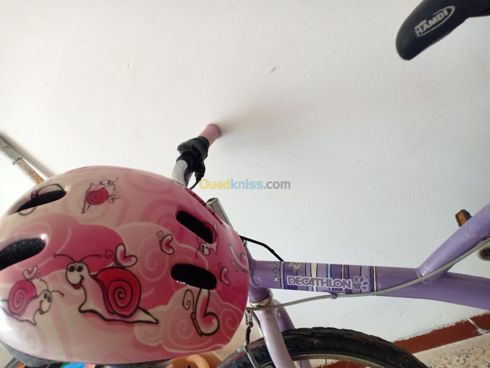 Vélo pour fille Decathlon plus casque