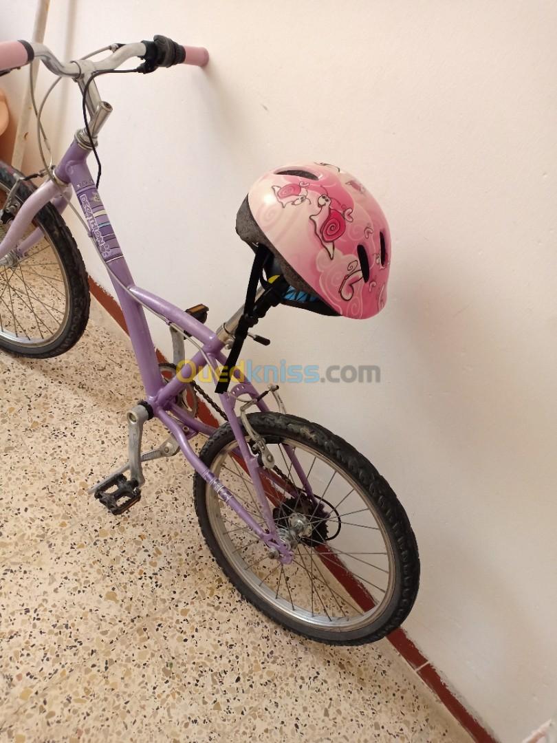 Vélo pour fille Decathlon plus casque