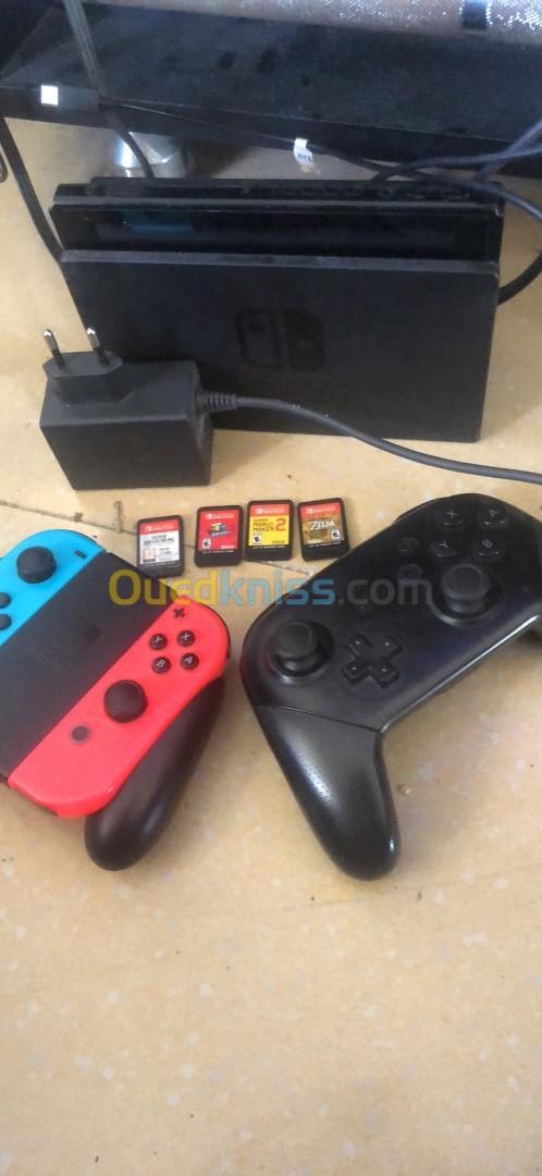 Nintendo switch V1 non flacher dorigine état 10/10 avec 4 cartouche jeux et manette pro original