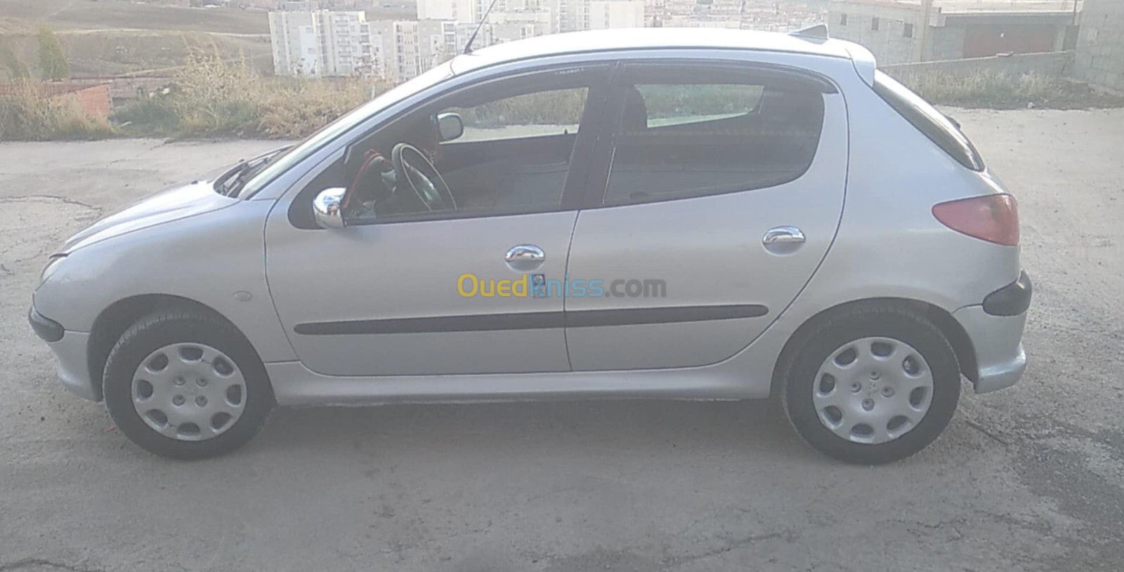 Peugeot 206 2004 ديمي كونفور