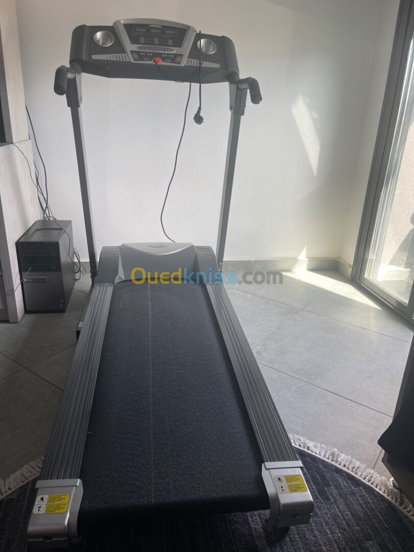 Tapis de sport peu utilisé 