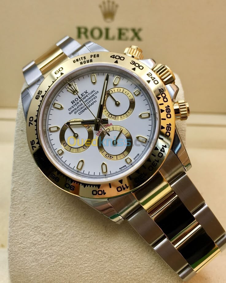 Montre Rolex Daytona gold silver