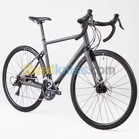 Vélo route cyclotouriste triban rc500 noir 