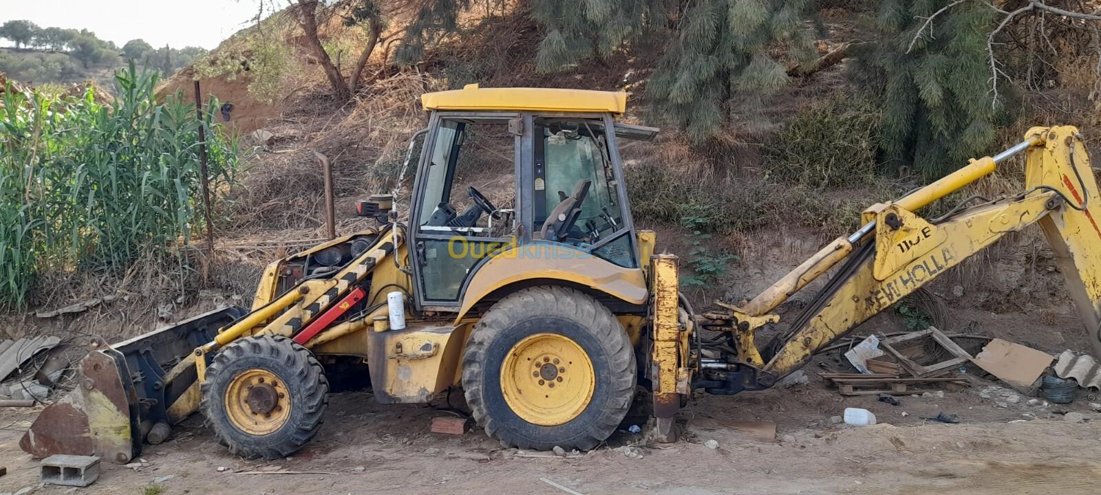 New Holland 110 E 2004