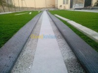 بومرداس-الجزائر-بناء-و-أشغال-béton-poreux-imprimé-gazon-synthétique