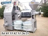 آلة لعصــــر و اتستخراج  الزيوت