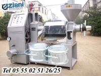 آلة لعصــــر و اتستخراج  الزيوت