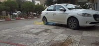 سوق-أهراس-سدراتة-الجزائر-صالون-سيدان-peugeot-301-2014