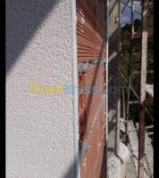 oran-bir-el-djir-algerie-construction-travaux-monocouche-façade