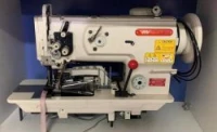 Machine a coudre raseuse