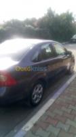 alger-dar-el-beida-algerie-berline-ford-focus-4-portes-2010