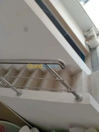 Rampe d'escalier inox et verre trempé