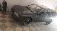 البليدة-بوقرة-الجزائر-صالون-سيدان-nissan-primera-1996