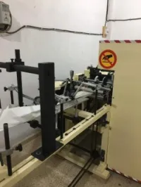 Machine fabrication sachets en papier