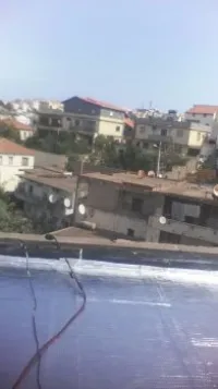 Chape et membrane goudronne 