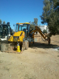 construction-travaux-location-engines-retro-chargeur-case-brise-roche-tlemcen-algerie