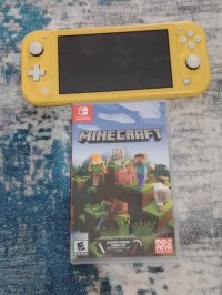 Nitendo switch lite + minecraft +fc24