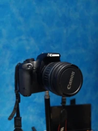 CANON 1000D AVEC 18-55 MM OU 75-300MM