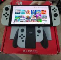Nintendo switch oled flashée 128 go en boîte 