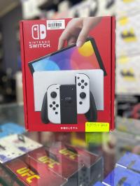 أجهزة-ألعاب-الفيديو-nintendo-switch-oled-puce-pleine-de-jeux-درارية-الجزائر