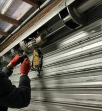 بناء-و-أشغال-depannage-installation-rideau-metallique-reparation-portes-de-garage-et-sectionnelles-industrielles-دالي-ابراهيم-الجزائر