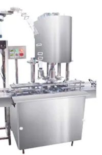 Remplisseuse 4 becs +Bouchonneuse automatique avec table