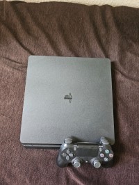 أجهزة-ألعاب-الفيديو-ps4-slim-flache-باب-الزوار-الجزائر