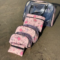Sac de toilette 5 piéces rose avec  motifs