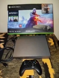 Xbox one x 1TB + 33 jeux 