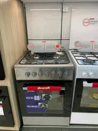 cuisinière Brandt vedette Inox gaz/gaz